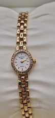 Rotary 9ct Gold Ladies Watch with Diamond Bezel & Box